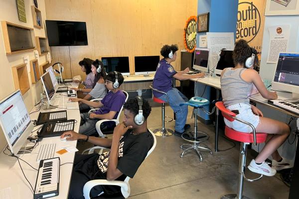 Youth edit audio on computers