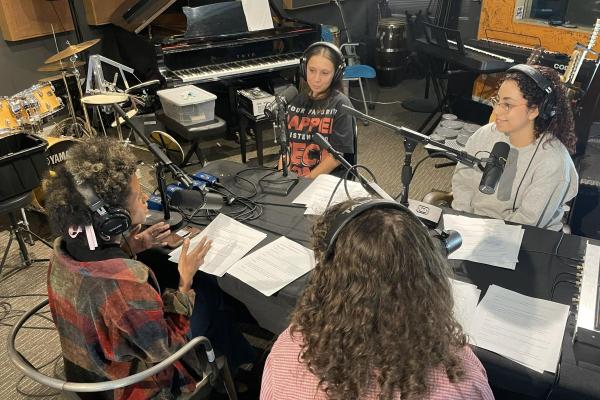 Podcast interns record a roundtable session