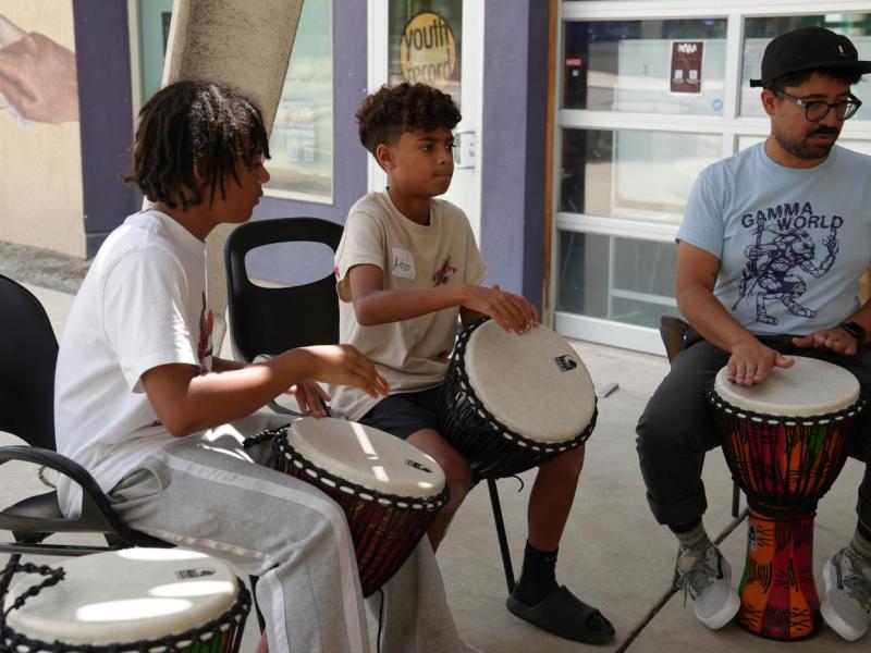 campers play drums